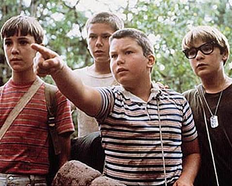 Stand by Me.

I mean. Yes to When Harry Met Sally. To Misery. To Spinal Tap. To the whole Rob Reiner collection.

But mainly - Stand by Me.

Stand by Me is my favourite film of all time. 

You know when you watch a film at the right moment in your life and it stays with you for all time, like it is a part of you?

It is based on a short story - ‘The Body’ by Stephen King but no disrespect to the master the film is better. It adds something so warm and real to it.

The story is simple. As small and simple as it gets. Four boys hear of a dead body in the woods and go on a journey to see it. On the way the adventure becomes a defining moment in their lives. 

It is the ultimate 80s film. Even the fact that it is set in the 1950s doesn’t stop that. The 1950s were massive in the 1980s, from Back to the Future to Grease reruns to Happy Days to quiffs and drainpipes.

It is an 80s film because it manages to be accessible and high quality in every breath. Because it has the two most 1980s faces - those of Corey Feldman and River Phoenix. Because it is based on Stephen King. Because it looks so good as it was shot on Kodak film rather than digital, rendering the colours rich and deep. Because it was edgy in a gentle real way, rather than a pointless gross out way (cherry pie scene excepted).

Anyway.

It’s a film with heart and humanity and leeches. And on the day Donald Trump insults a dead man in his grotesque style it is poignantly ironic that one of Rob Reiner’s greatest works involves artistic, sensitive, narrow shouldered kids having to face up to big bullies.

I never saw it at the cinema. I got it from the video store on a day I played truant. Then rented it many times over.

When River Phoenix says to Will Wheaton: ‘I’m never gonna get out of this town am I, Gordie?’ I felt it like rain. And then the answer came: ‘You can do anything you want, man.’ Worth a million podcasts.

As with the book The Outsiders, Stand by Me gave Gen X boys broad role models. Not good as in goody goody. Good as in boys who aren’t toxic douches. Just real true troubled human beings.

Heartfelt humanity. Thank you, sir.