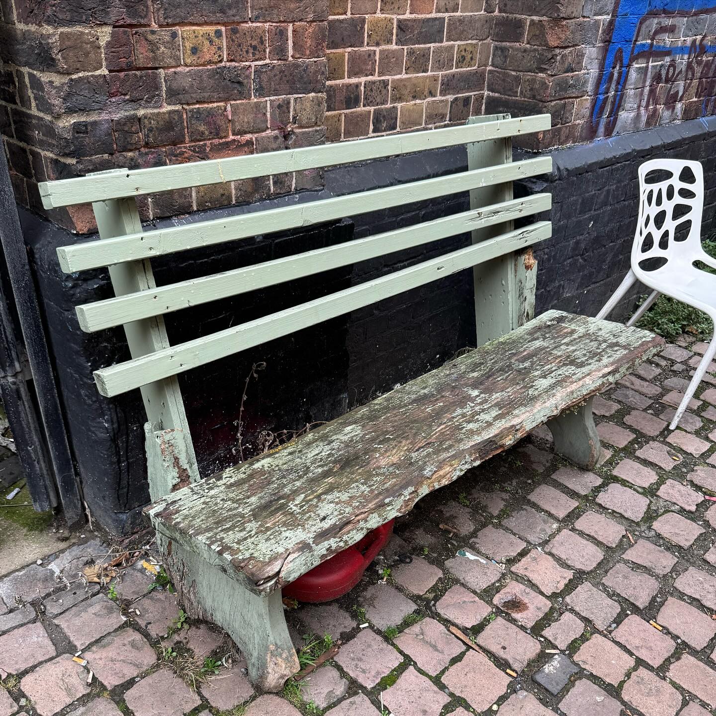 I sit on this old battered bench twice a week while I wait for my daughter to finish her singing class. It is a very world-weary bench but I like it because my daughter always comes out so happy after an hour of singing. In fact it is possibly my favourite bench in the world.